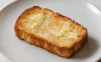 Small Piece of Buttered Toast