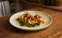Tortelli of Butternut Squash and Ricotta with Pickled Red Onion, Leafy Greens, Butter Emulsion, and Fried Onion