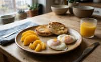 Citrus-Scented Eggs with Toasted English Muffins and Orange Juice