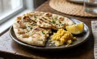 Charred Naan with Fresh Ginger and Lemon