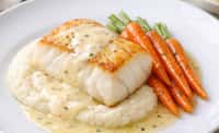Cod with Beurre Blanc, Cauliflower Purée, and Buttered Spring Carrots
